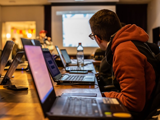 People sitting in a computer training class